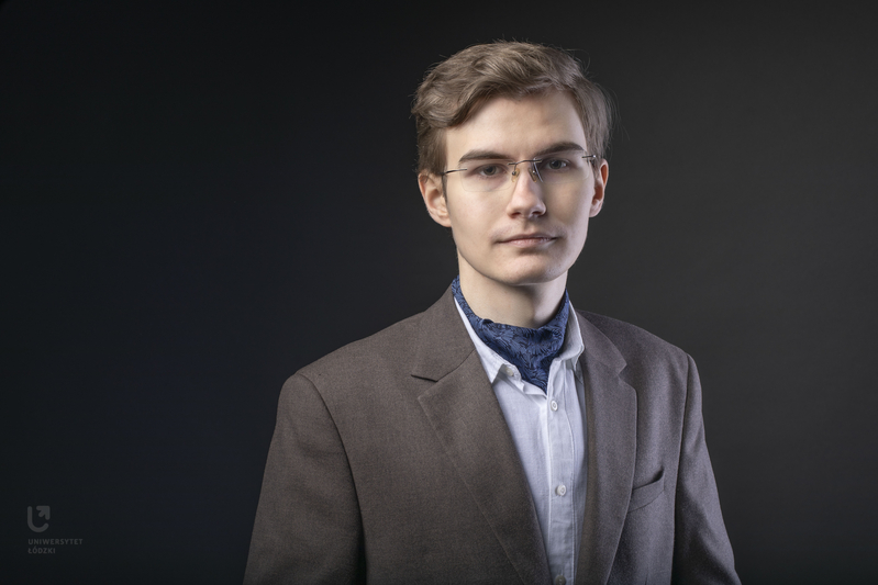 The President of the University of Lodz Students' Government Council – a young man wearing glasses and a brown jacket