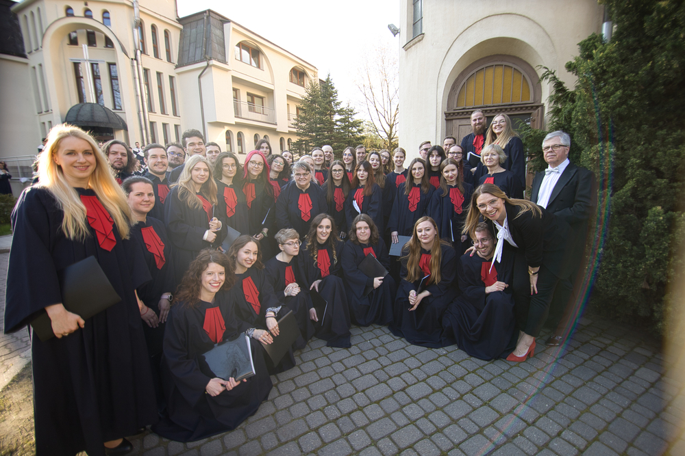 A group photo of the University of Lodz Choir members wearing costumes