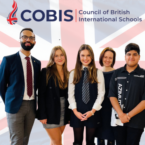 3 women and 2 men from BISUL standing against the background of British flag. Caption: COBIS Council of British International Schools